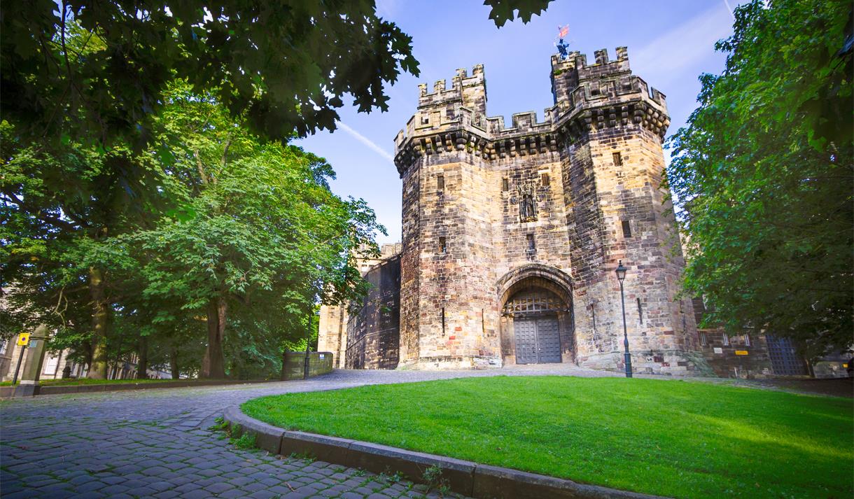 The main gate of Lancaster Castle on a sunny day